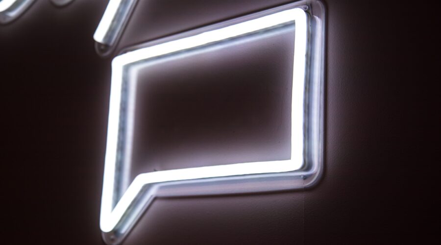white neon light signage on wall